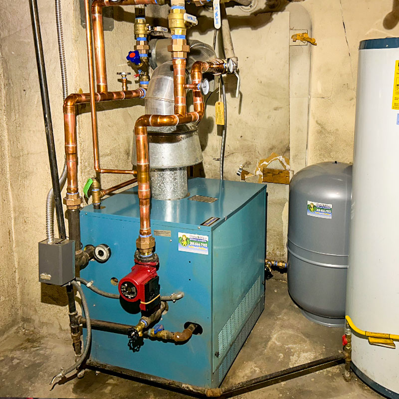 A boiler system with pipes and fittings.